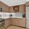 Kitchen with a gas stove and stainless steel finishes.