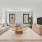 Living room with couch, coffee table, entertainment stand, and tv.