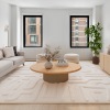 Living room with neutral tones and natural lighting.